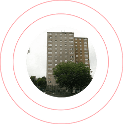 High-rise residential building framed within a bold red circular design